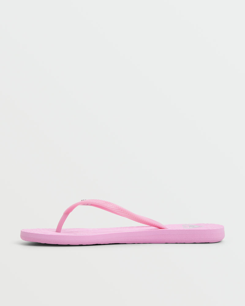 A single Roxy Antilles II Sandal in pink, featuring a textured sole and a thong strap, is shown from the side on a plain white background.