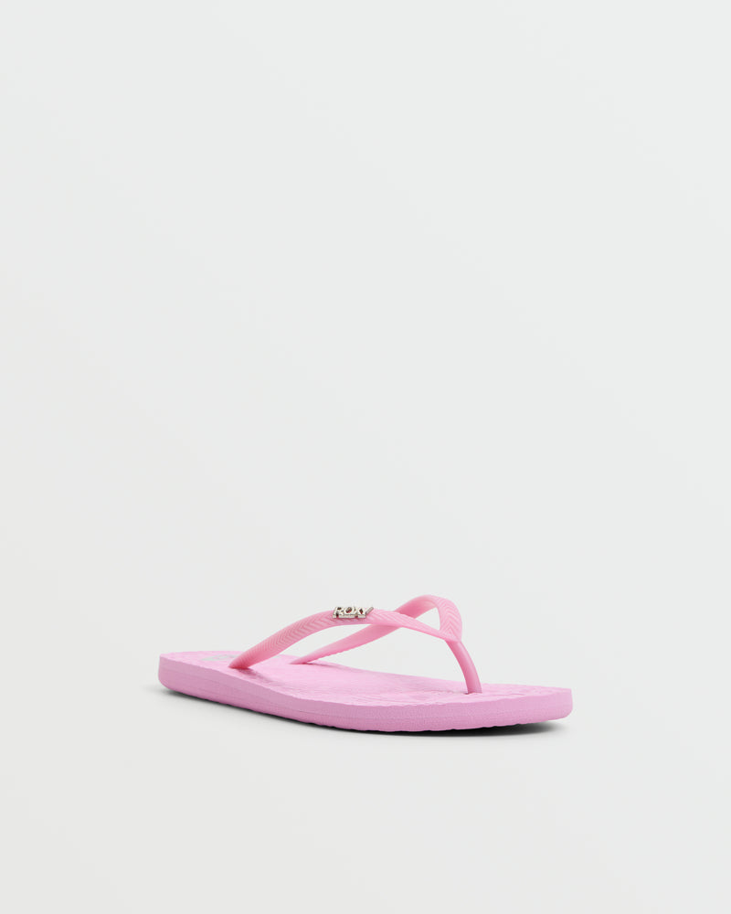 The Roxy Antilles II Sandal in light pink features thin straps and a sleek design, making it a stylish and comfortable choice for any beach adventure. Displayed against a plain white background.