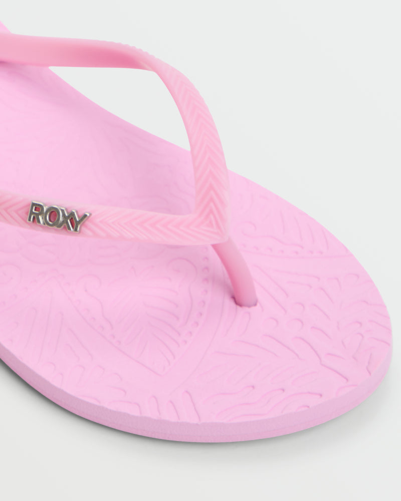 Close-up of the pink Roxy Antilles II Sandal, featuring embossed leaf patterns and a silver ROXY logo on the strap—a stylish, comfy choice for your beach sandals collection.