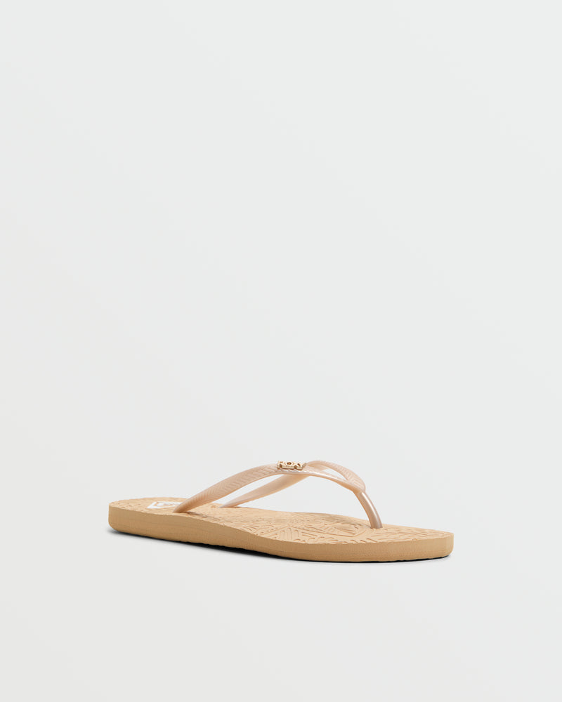 A single beige Roxy Antilles II Sandal with a textured sole and thin straps, shown on a plain white background—ideal beach footwear for those seeking comfortable sandals.