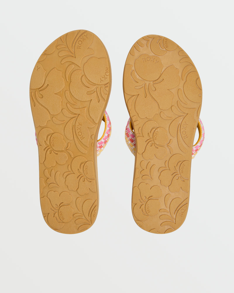 A pair of Roxy Porto IV Sandals with tan soles featuring embossed floral patterns, shown from the bottom, and pink and multicolored woven straps partly visible.