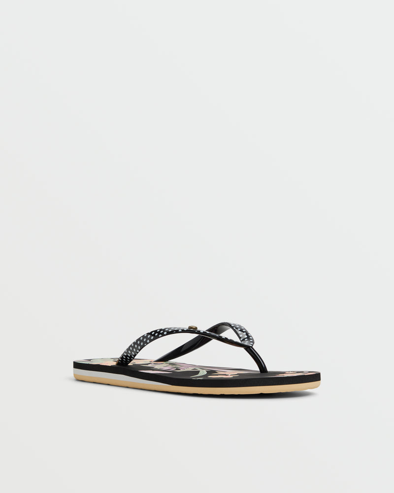 The Roxy Portofino III Sandal is a black summer sandal with textured black straps and a printed floral sole, combining comfort and style.