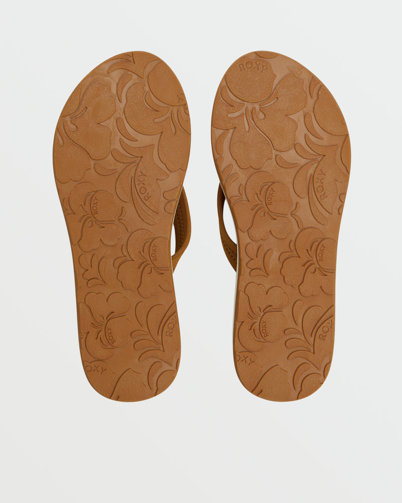 The Vista Loreto II Sandal by Roxy is a pair of brown flip flops with floral-patterned soles and "ROXY" embossed underneath. This casual footwear offers soft support and is displayed on a plain white background.