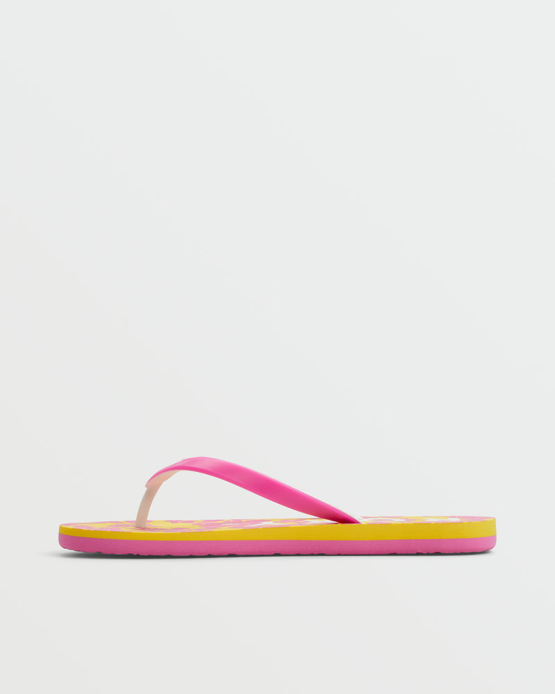 A brightly colored Roxy Tahiti VII Sandal with a pink thong strap and yellow sole is displayed on a plain white background—ideal for anyone seeking stylish, comfortable summer sandals.