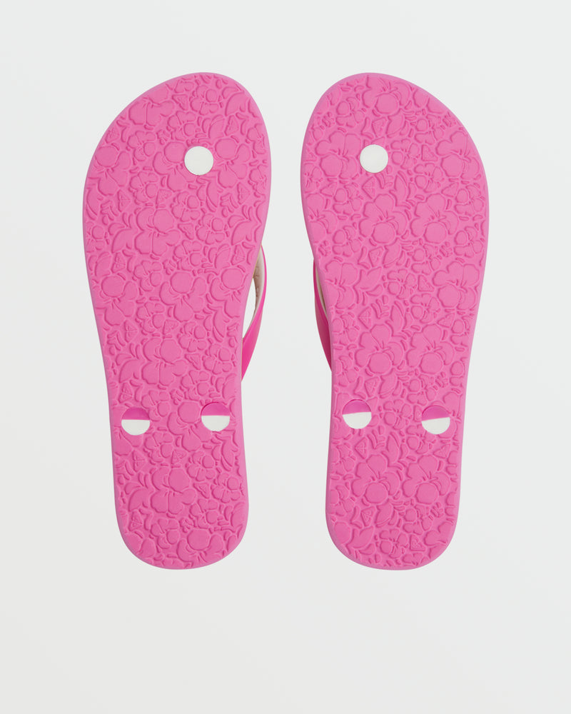 A pair of Roxy Tahiti VII Sandal soles in bright pink with a floral textured pattern and three strap holes per sandal, shown facing up on a white background—perfect comfy sandals for summer.