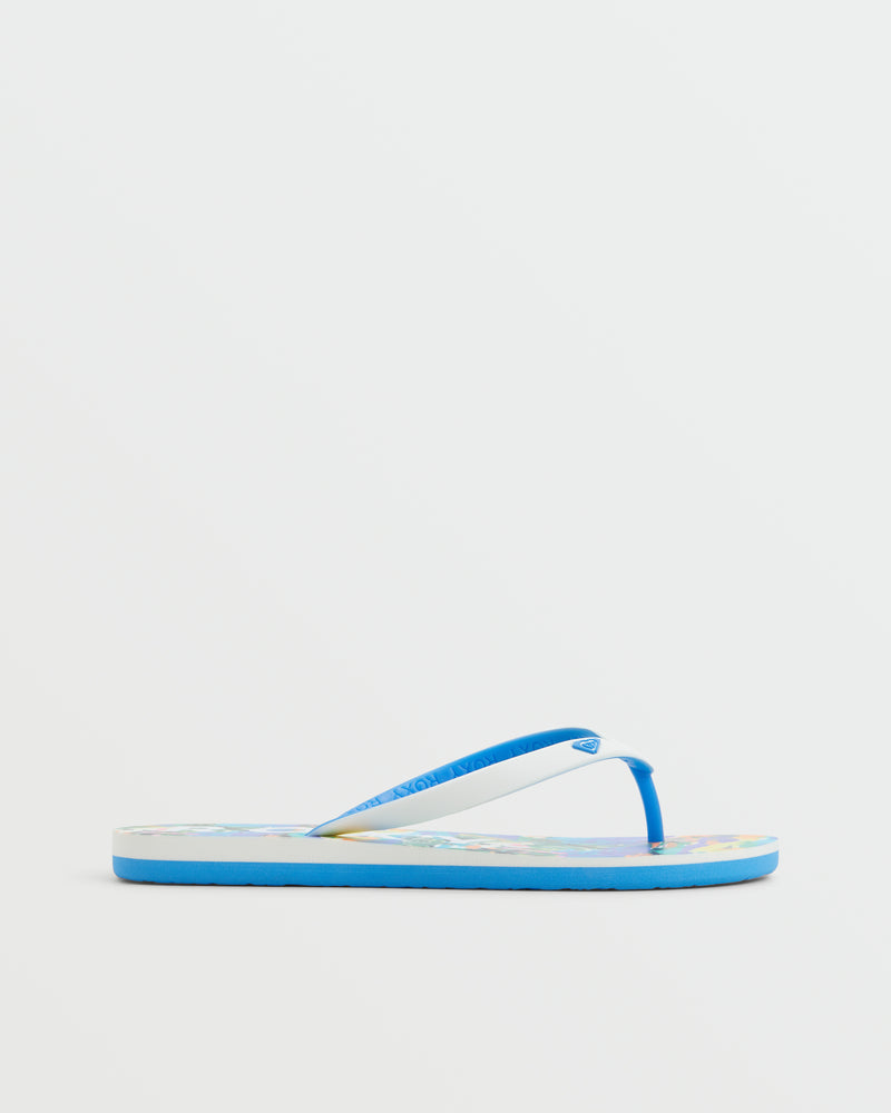 The Roxy Tahiti VII Sandal features slim blue straps and a flat sole, displayed in side profile on a white background—ideal for anyone seeking comfortable summer sandals.