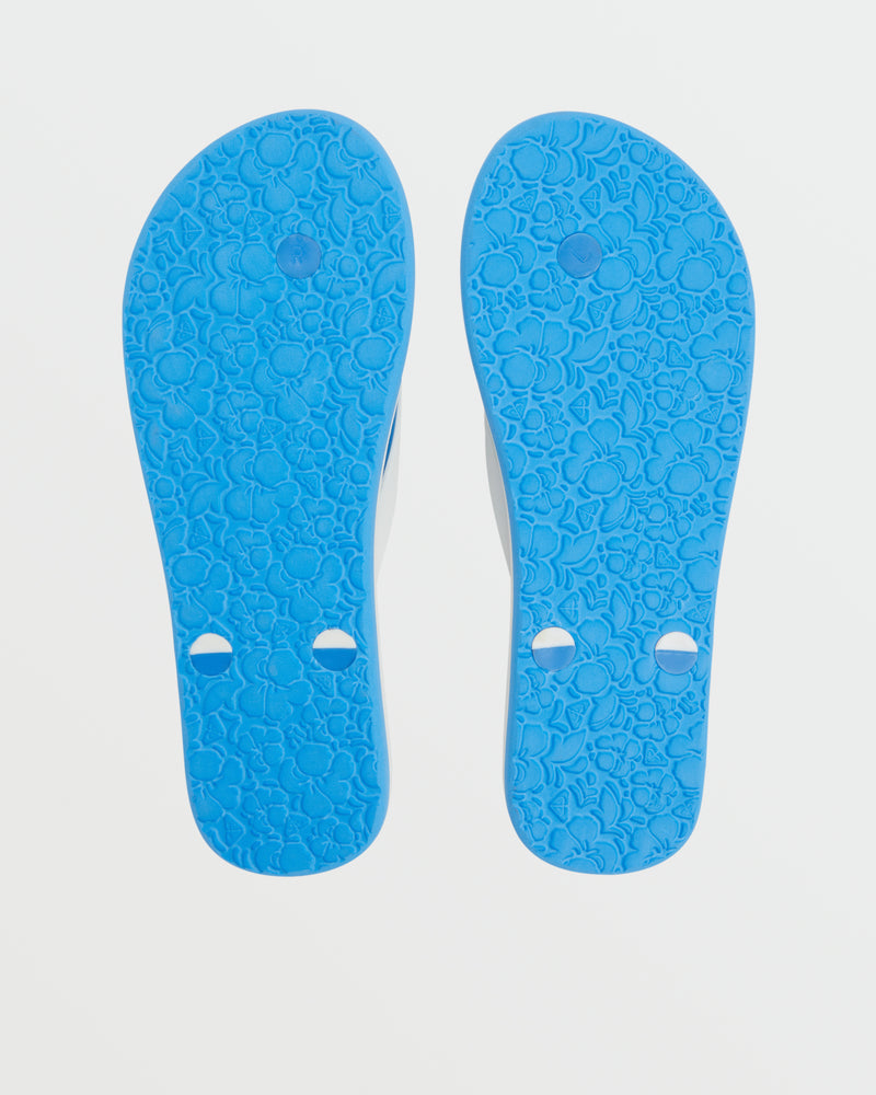 The Roxy Tahiti VII Sandal is a pair of blue summer flip flops with a floral sole pattern and two round holes near the front, ideal for comfortable walks on warm days.
