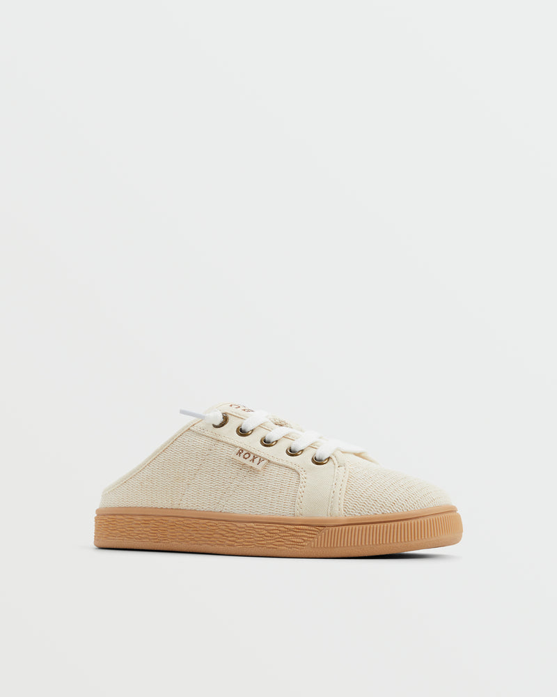 A single beige Sunny Stroll Mule Sneaker by Roxy, featuring white laces and a light brown rubber sole, is displayed against a plain white background. The brand name Roxy appears on the side of the shoe.