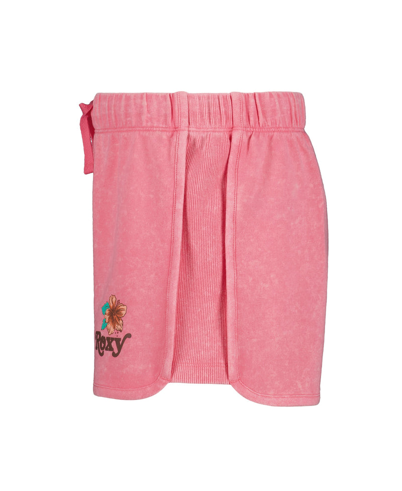 The Roxy Girls' Sunset Short features a soft pink French terry wrap design with an elastic waistband, side tie, and a flower-accented Roxy logo—ideal to pair with your favorite surf shorts.