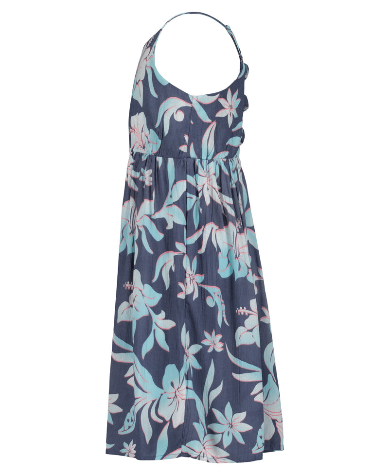 The Roxy Girls' Hibiscus Hype Dress is a sleeveless, knee-length dress with a blue base, light blue and white floral prints, adjustable straps, and an elastic waistband for a flattering fit and flare silhouette.