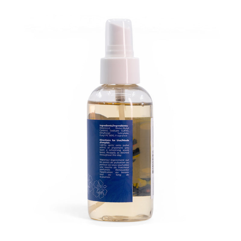 The Roxy Deep Dive Body Mist comes in a clear spray bottle with light yellow liquid, a white pump top, and a blue label with white text and floral art. It features waterlily and marine notes for a refreshing fragrance.