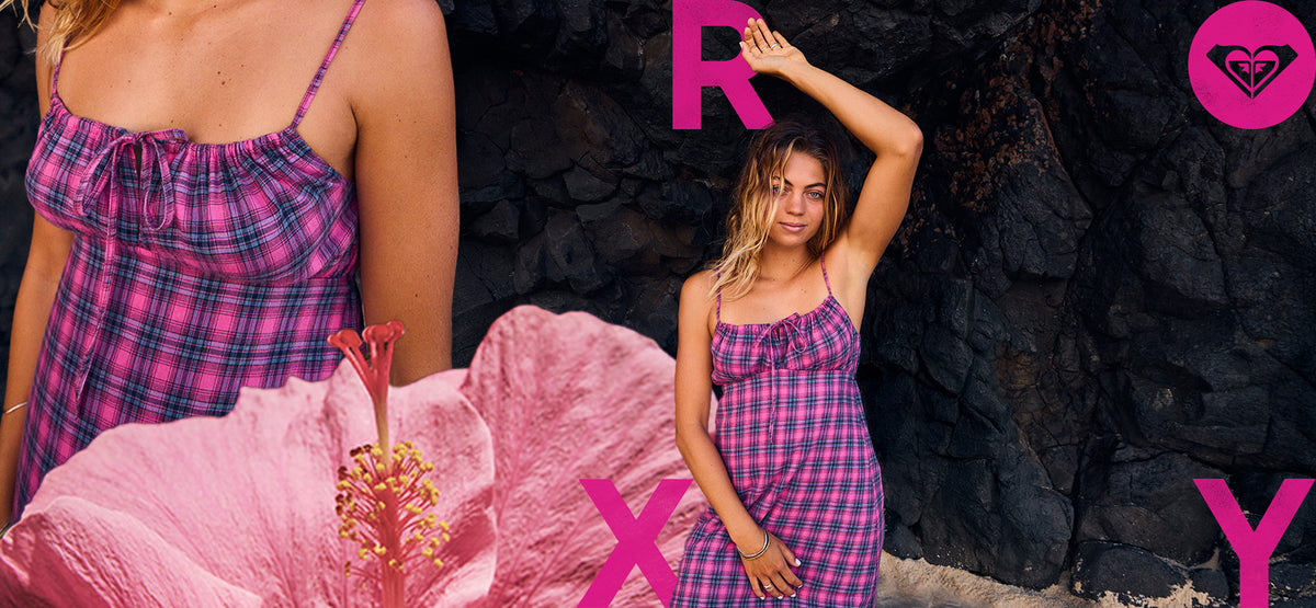 A woman wearing a pink and purple plaid spaghetti-strap dress stands against a dark rocky background, with a large pink flower in the foreground and pink letters 'R', 'X', 'Y' overlaid on the image. A cropped view of the same model appears on the left side.