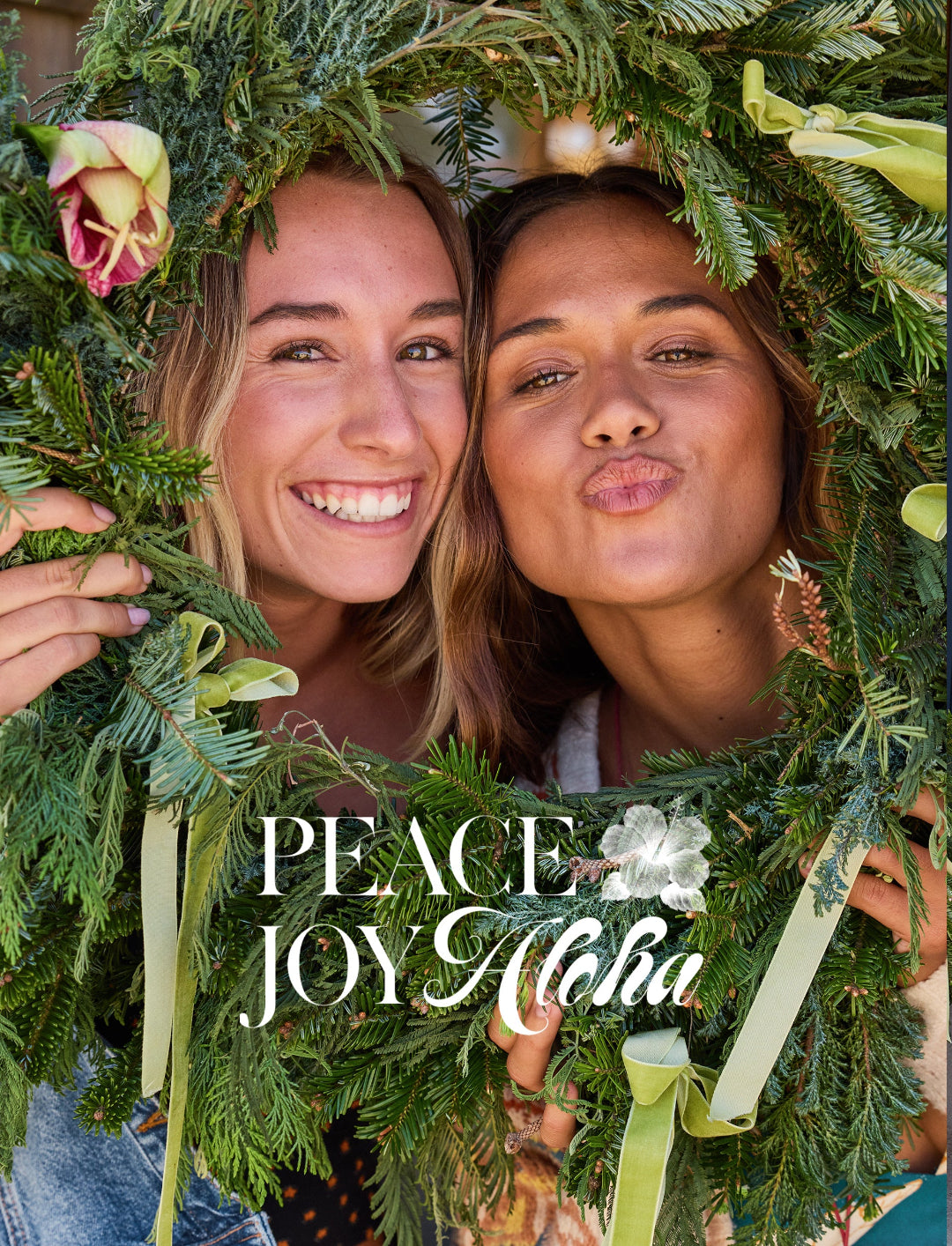 Two people surrounded by greenery with 'Peace Joy Aloha' text