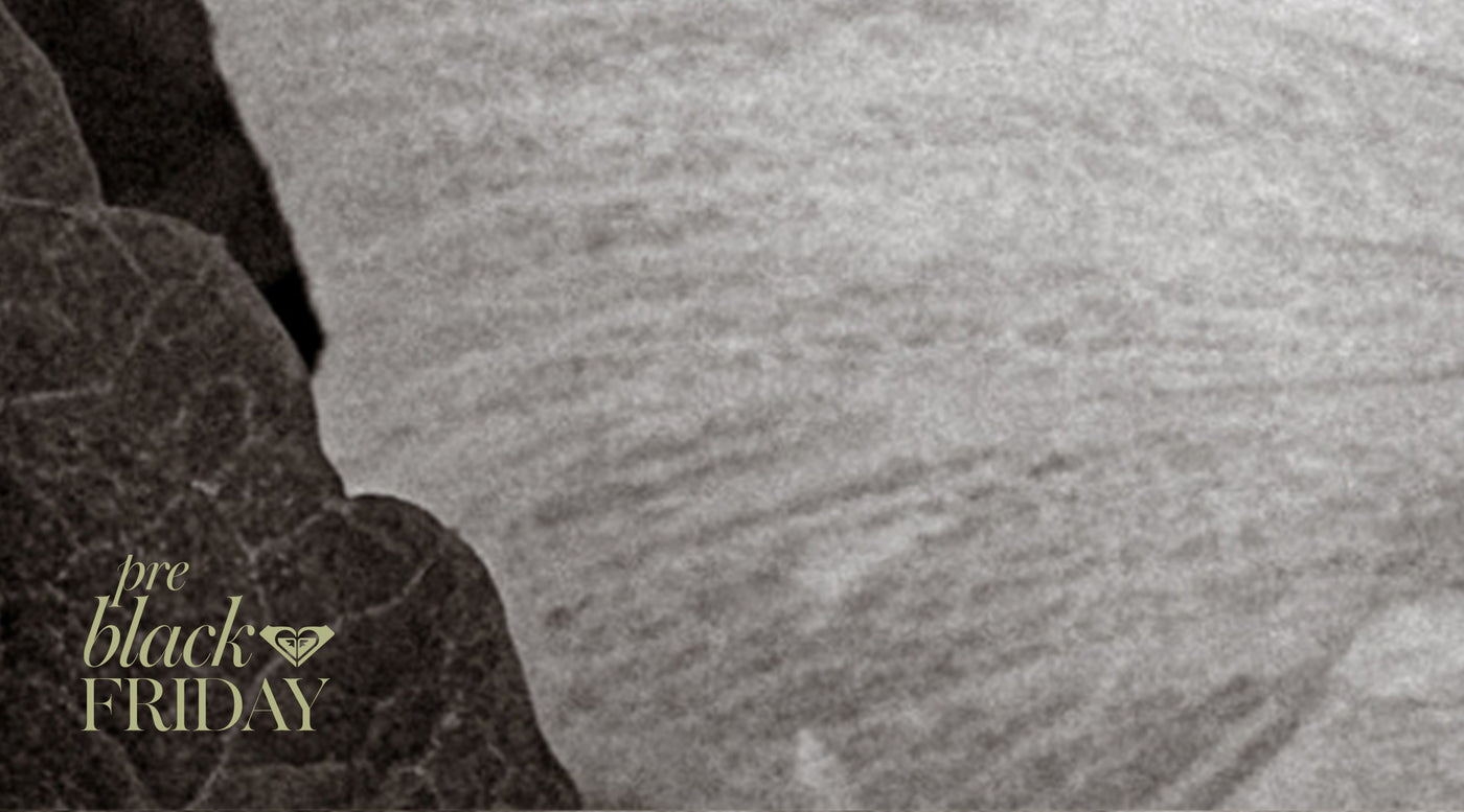 Close-up of a textured fabric with pre black FRIDAY text overlay