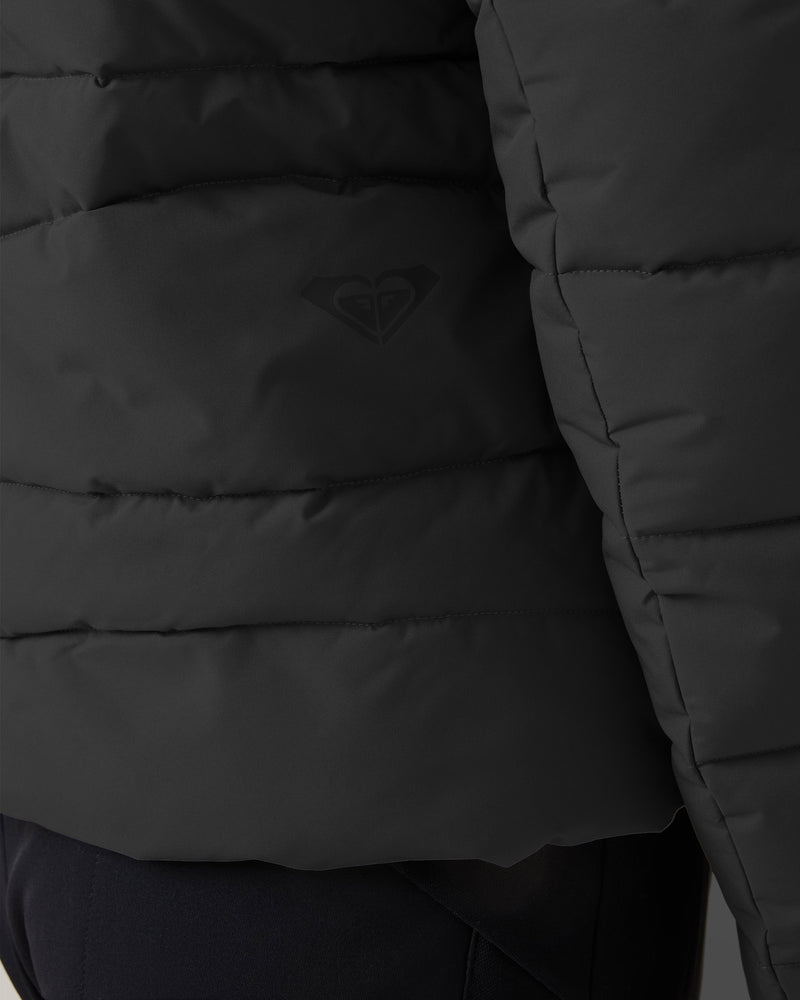 Close-up of the Roxy Abby Quilted Puffer in black, showing its horizontal quilting, subtle side logo, and regular fit—perfect for cool-weather layering. Only part of the sleeve and body are visible.