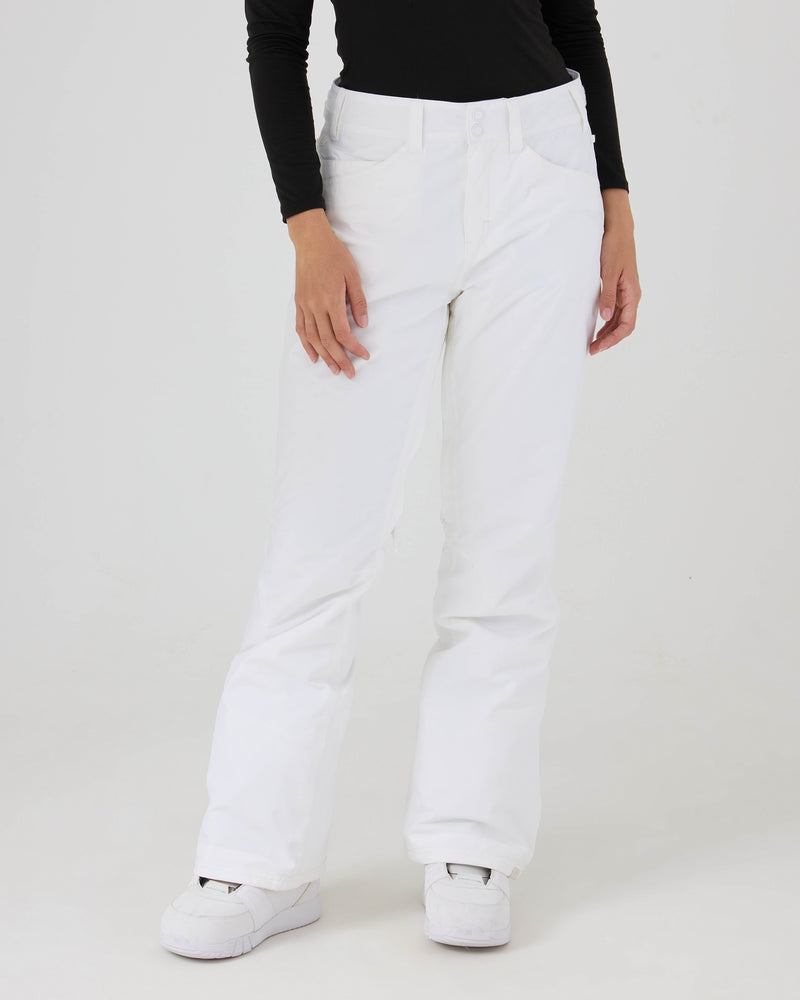 A person wearing a black long-sleeve top and Roxy Backyard Pants made from recycled polyester stands against a white background. Only the body from shoulders down is visible. The person is also wearing white shoes.