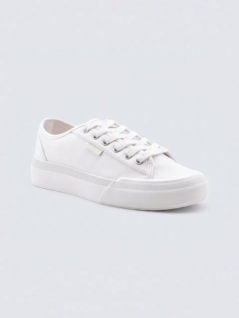The Roxy Marina Sneaker features a white canvas low-top design with white laces and a rubber sole, shown angled against a light gray background—perfect for effortless women’s style.