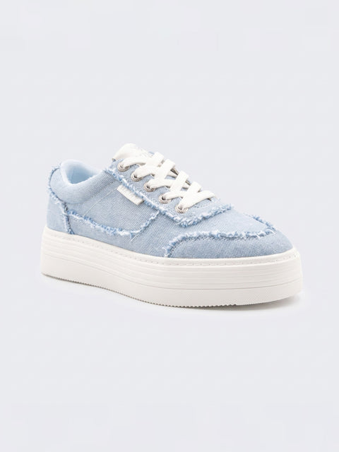 The Roxy Sheilahh 2.0 Sneaker features light blue denim with frayed edges, white laces, and a chunky white platform sole, displayed against a simple light background.