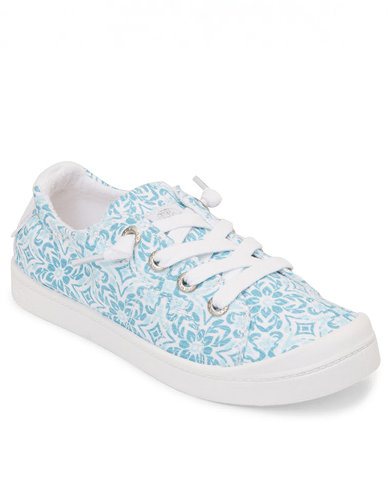 The Roxy Bayshore Plus Sneaker features a white base with light blue floral patterns, white laces, silver eyelets, and a white rubber sole, capturing coastal style and displayed at an angle on a white background.