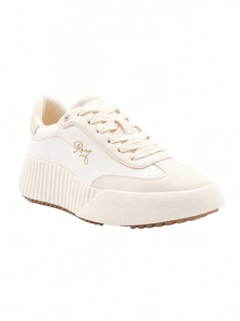 The Roxy Bling Sneaker features a cream color, thick textured sole, lace-up front, and embroidered Roxy logo on the side. Its minimal design and slightly ridged outsole provide both style and added grip.