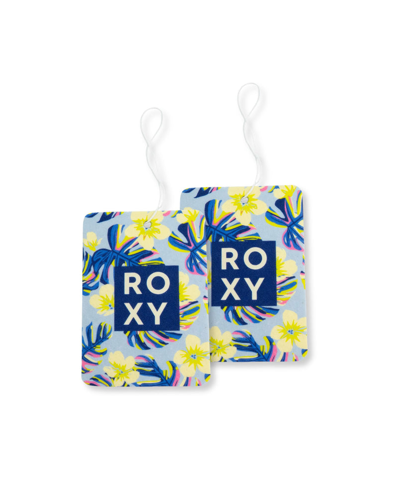 Introducing the ROXY Air Freshener 2-Pack Variety Pack: two rectangular air fresheners with a tropical floral design in vibrant yellow and blue tones, each displaying the ROXY logo in white lettering on a navy square. Finished with convenient white hanging loops, they fill your space with a refreshing marine breeze scent complemented by subtle notes of coconut.