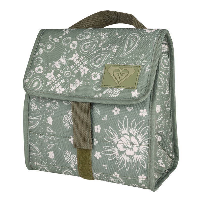 Introducing the Smiling Seagulls Lunch Bag by Roxy: a charming green insulated lunch bag adorned with a playful white floral and paisley print. It features a sturdy brown fabric handle, secure Velcro closure, and a stitched Roxy logo patch on the front flap. The boxy silhouette and structured sides enhance both its style and functionality.