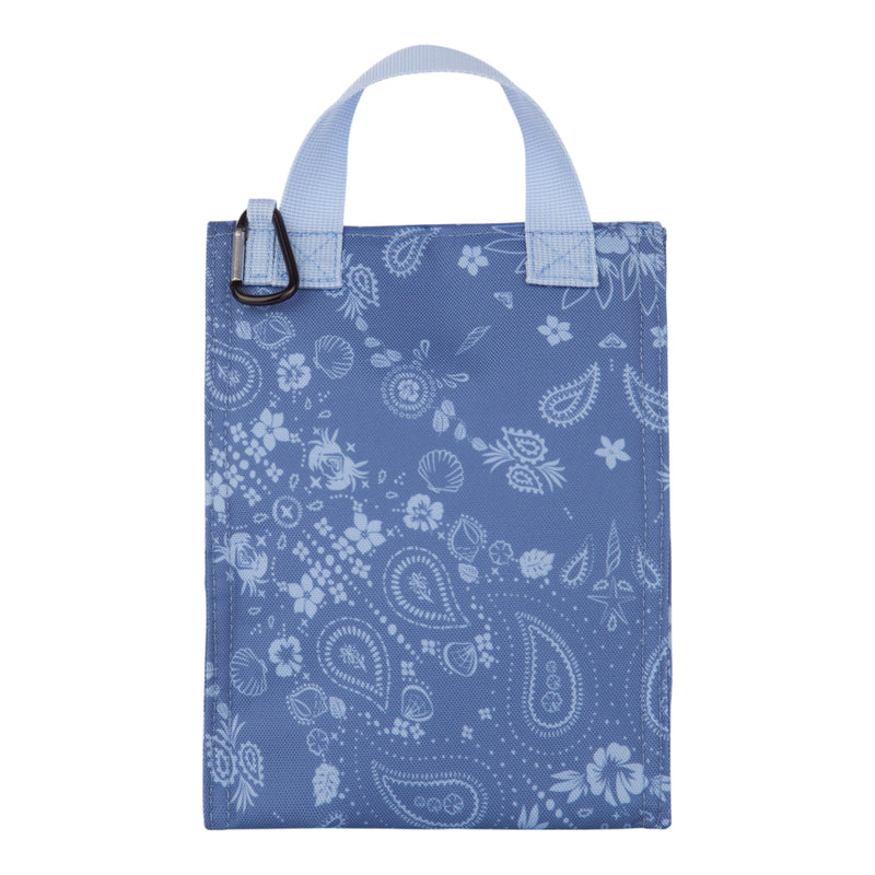 The Lunch Hour Lunch Bag by Roxy is a rectangular blue fabric bag featuring light blue handles and a white paisley floral pattern, displayed against a white background.