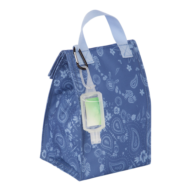 The Roxy Lunch Hour Lunch Bag features a blue design with a white paisley pattern, a light blue handle, and comes with a small bottle of green hand sanitizer attached by a clip.