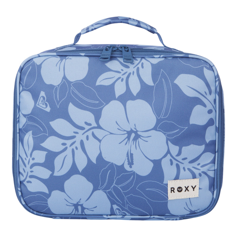 The Groove In Life Lunch Box by Roxy is a rectangular blue lunch bag featuring a floral hibiscus print, a top handle, double zippers, and a white Roxy brand patch on the bottom right corner.