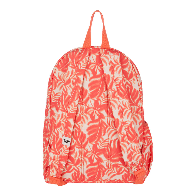 The Roxy Sugar Baby Canvas Backpack features a vibrant red and white tropical leaf pattern, orange straps, and a small white logo tag on the lower left. Crafted from recycled cotton, it’s a sustainable choice for everyday wear.