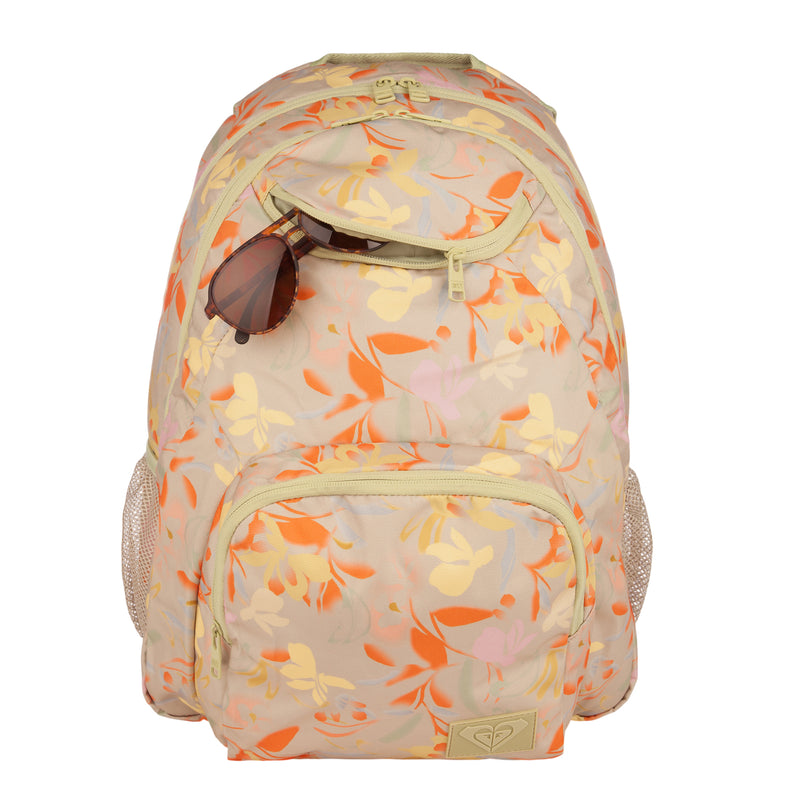 The ROXY Shadow Swell Backpack in beige showcases an orange and yellow floral pattern, multiple zippered compartments, mesh side pockets, and comes styled with brown sunglasses hooked onto the front pocket zipper.
