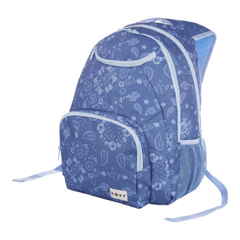 The Roxy Shadow Swell Backpack features light blue paisley and floral patterns, light blue zippers and trim, a front pocket, mesh side pocket, and is finished with a small Roxy label on the front.