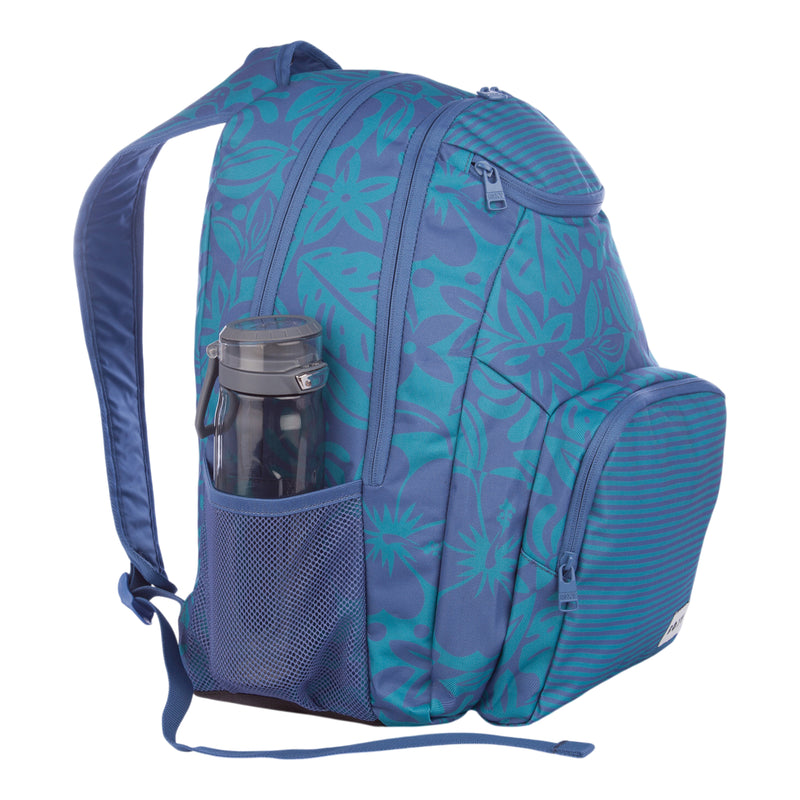 A blue and teal floral-patterned Roxy Shadow Swell Backpack featuring multiple zippered compartments, a striped front pocket, and a mesh side pocket holding a black water bottle.