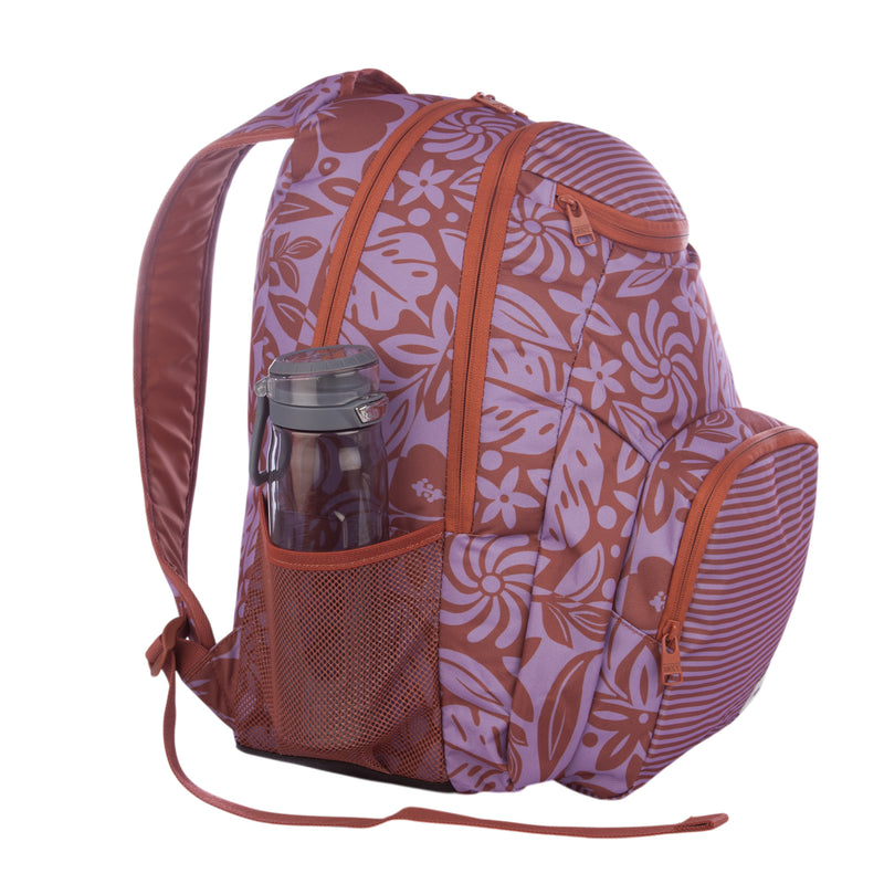 A Roxy Shadow Swell Backpack featuring a pink and orange floral design, multiple zippered compartments, and a mesh side pocket that holds a dark water bottle.