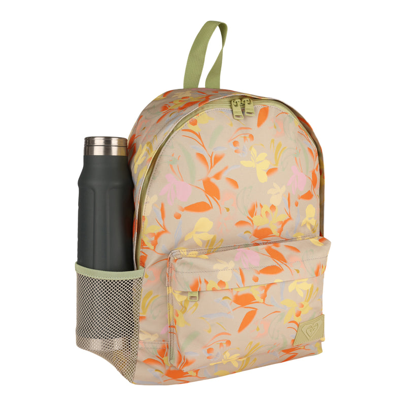 A sustainable Roxy Sugar Baby Canvas Backpack featuring a colorful floral pattern, a front pocket, and a green handle, with a black water bottle in the side mesh pocket.