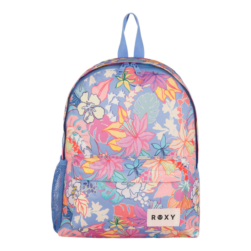 The ROXY Sugar Baby Bottle Backpack features a colorful floral design with pink, orange, yellow, and purple flowers on a blue background. Made from recycled polyester for sustainability, this backpack includes a front pocket, side mesh pocket, blue handle, and a "ROXY" logo patch on the bottom front.