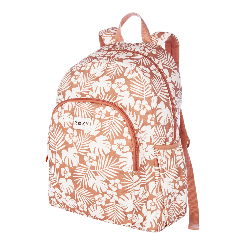 The Roxy Moon Magic Backpack in pink and white showcases a tropical floral and leaf print, and features a front zipper pocket, padded shoulder straps, and a top carrying handle, all displayed on a plain white background.