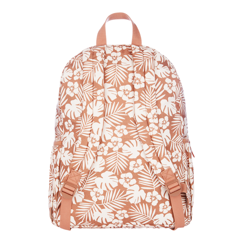 The Roxy Moon Magic Backpack is peach-colored with white tropical floral and leaf patterns, featuring adjustable peach straps and a top handle, displayed against a plain white background.