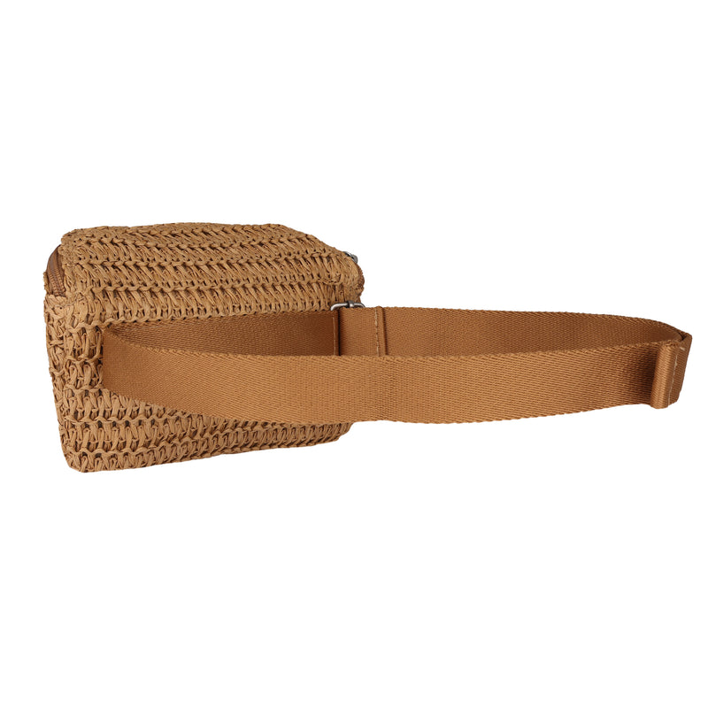The Roxy Spotless Sunnies Fanny Pack is a small woven straw bag with a wide, adjustable tan fabric strap, shown from the back against a white background—perfect for hands-free convenience.