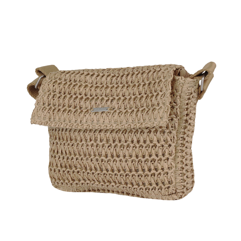 The Roxy Spotless Sunnies Crossbody Bag is a beige, woven bag with a textured pattern, flapover closure, adjustable strap, and a small metal accent on the front.