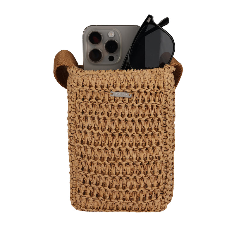 The Roxy Spotless Sunnies Phone Bag is a small woven crossbody with leather handles, designed to hold your smartphone and sunglasses—perfect for daily outings and capturing Roxy’s laid-back style.