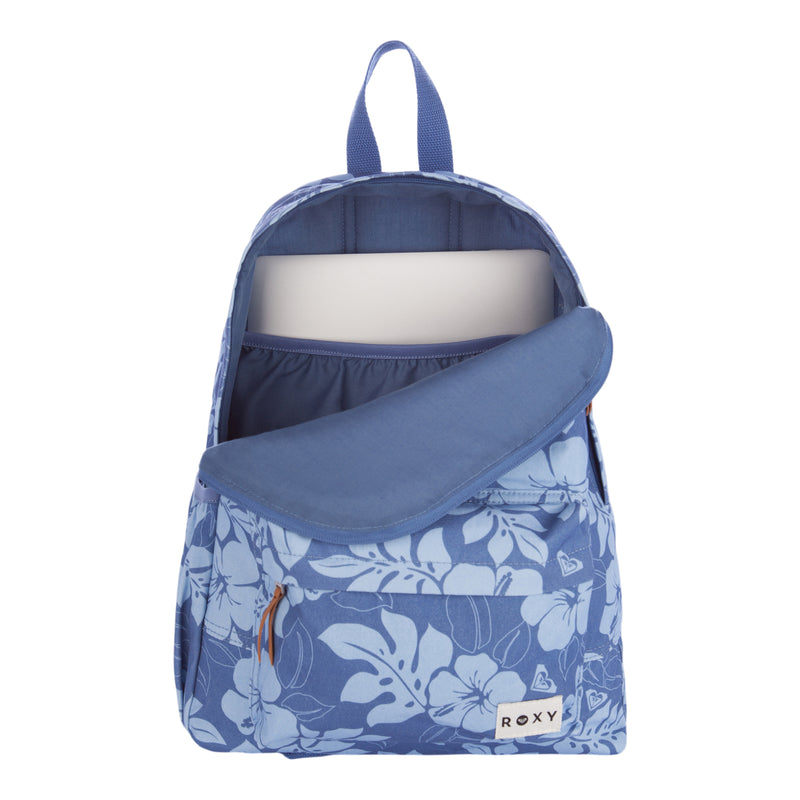 A blue floral Roxy Sugar Baby Canvas Backpack with the main compartment open, showing a laptop or tablet inside along with an elastic pocket, while the front pocket remains closed.