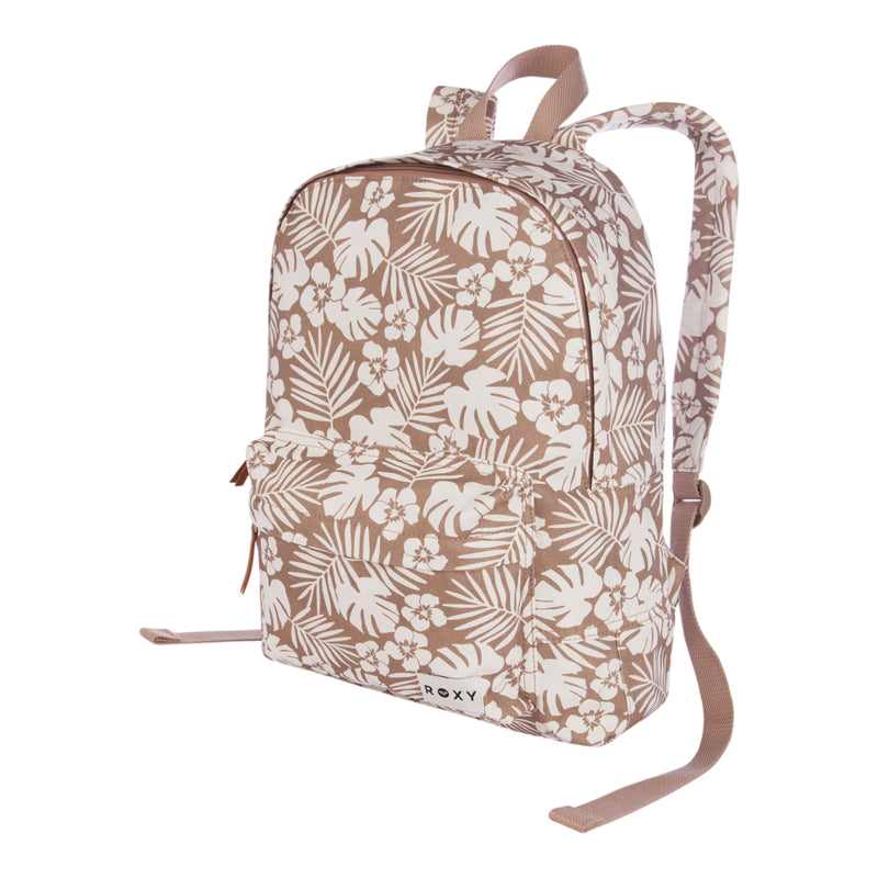 Roxy Sugar Baby Canvas Backpack in tan and white features a tropical floral print, a front pocket, adjustable straps, and a small white Roxy label at the bottom front.