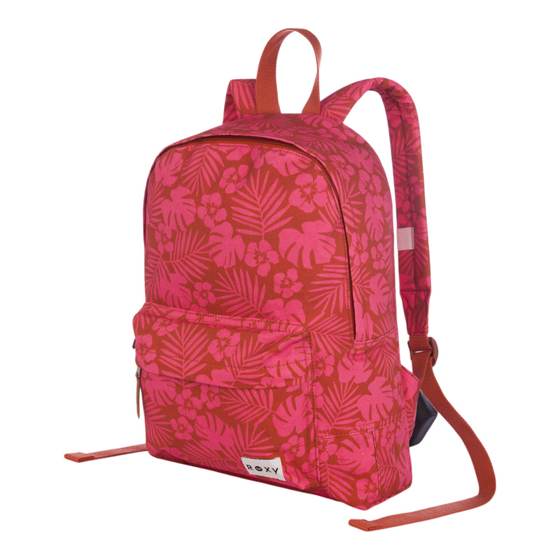 The Sugar Baby Canvas Backpack by Roxy features a pink and red floral pattern, a front pocket, two shoulder straps, a top handle, and a small white Roxy logo tag on the front.