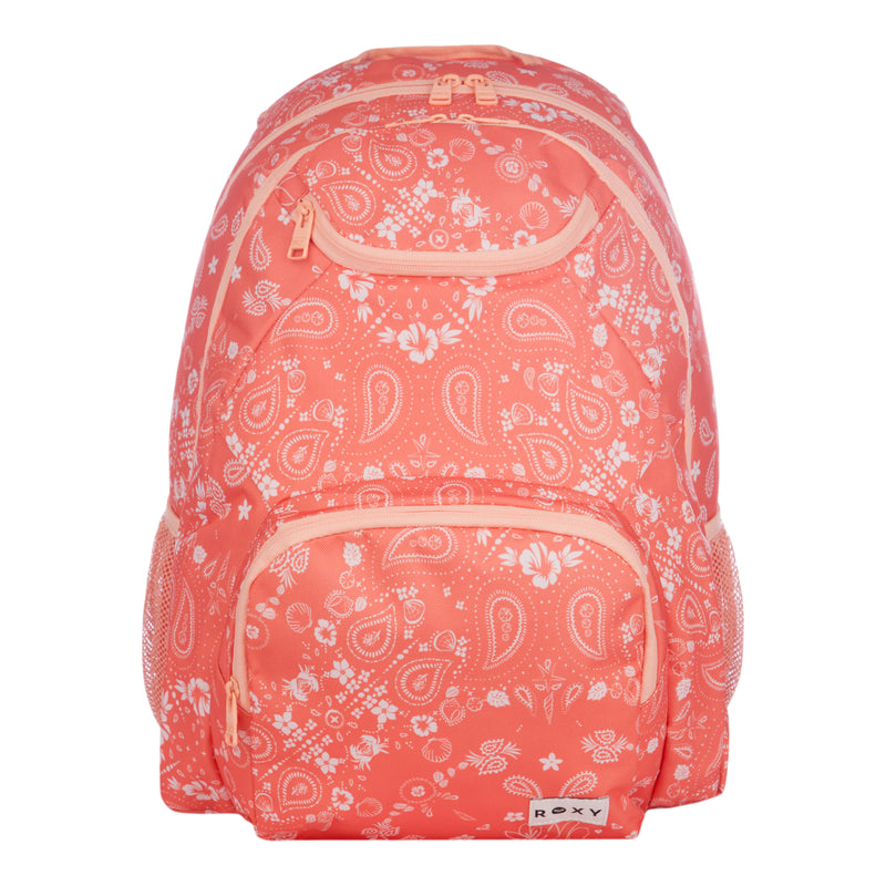 The Roxy Shadow Swell Backpack features a coral color with white paisley patterns, three zippered compartments, side pockets, and a Roxy brand label on the front pocket.