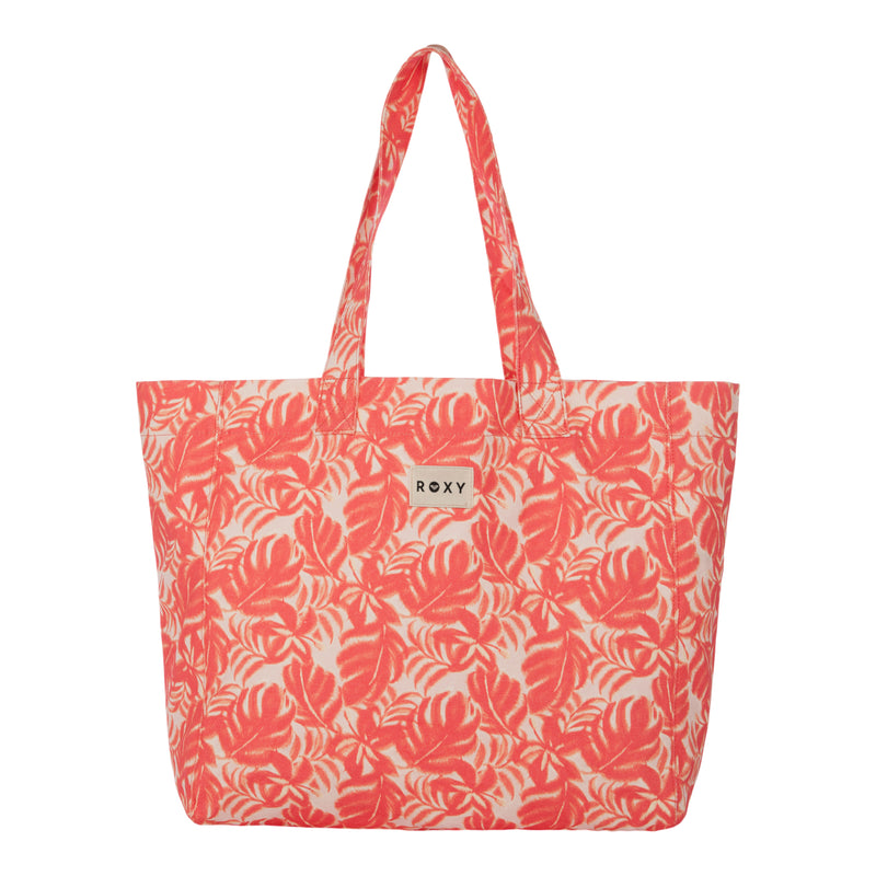 Coral Palm Haze Roxy Anti Bad Vibes Tote Bag featuring a leafy tropical pattern, two shoulder straps, and a small rectangular Roxy label on the front center. This stylish tote bag is crafted from recycled cotton for an eco-friendly touch.