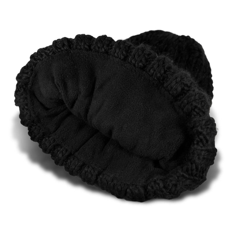 A close-up view of the Roxy Tram Beanie in black, shown inside out to highlight its soft polar fleece-lined interior and ribbed edge.