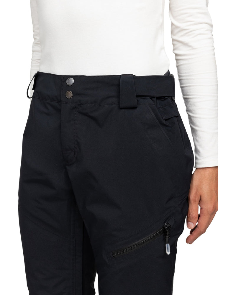 Person wearing a white long-sleeve shirt and black Roxy Gore-Tex Spridle Pants featuring an adjustable waistband and zipper pocket detail, shown from waist to mid-thigh.
