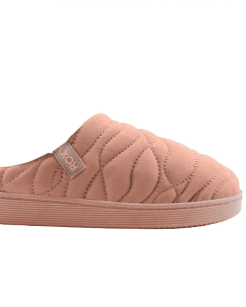 The Roxy Jasper Mule Slipper is a pink quilted nylon slide with a flat rubber sole and small side fabric tag, offering a cozy, minimalist style.