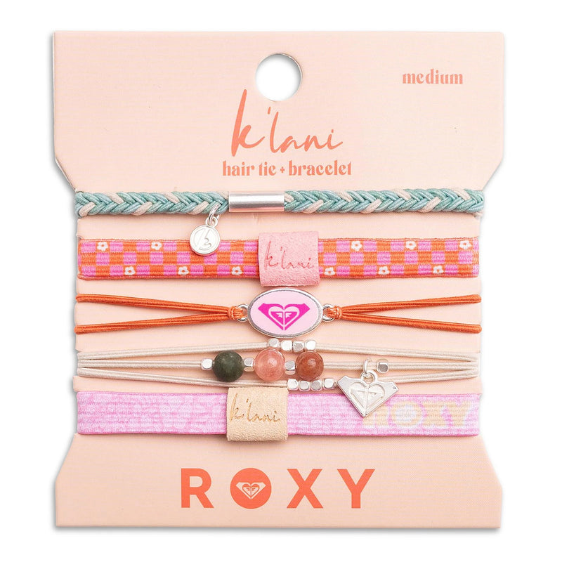 The K'lani x Roxy Hair Tie Bracelet set includes five vibrant Roxy hair tie bracelets on a pink card, each featuring unique patterns, charms, and natural stone beads in pink, orange, and teal tones.